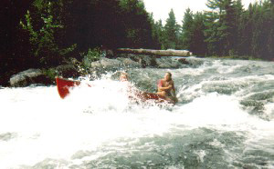 Shooting whitewater rapids.